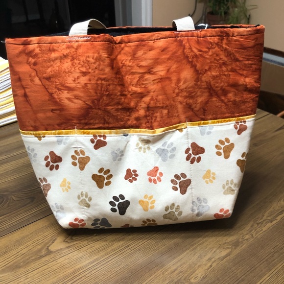 Homemade tote bag with outside pockets and covered in paw prints! - Picture 2 of 6